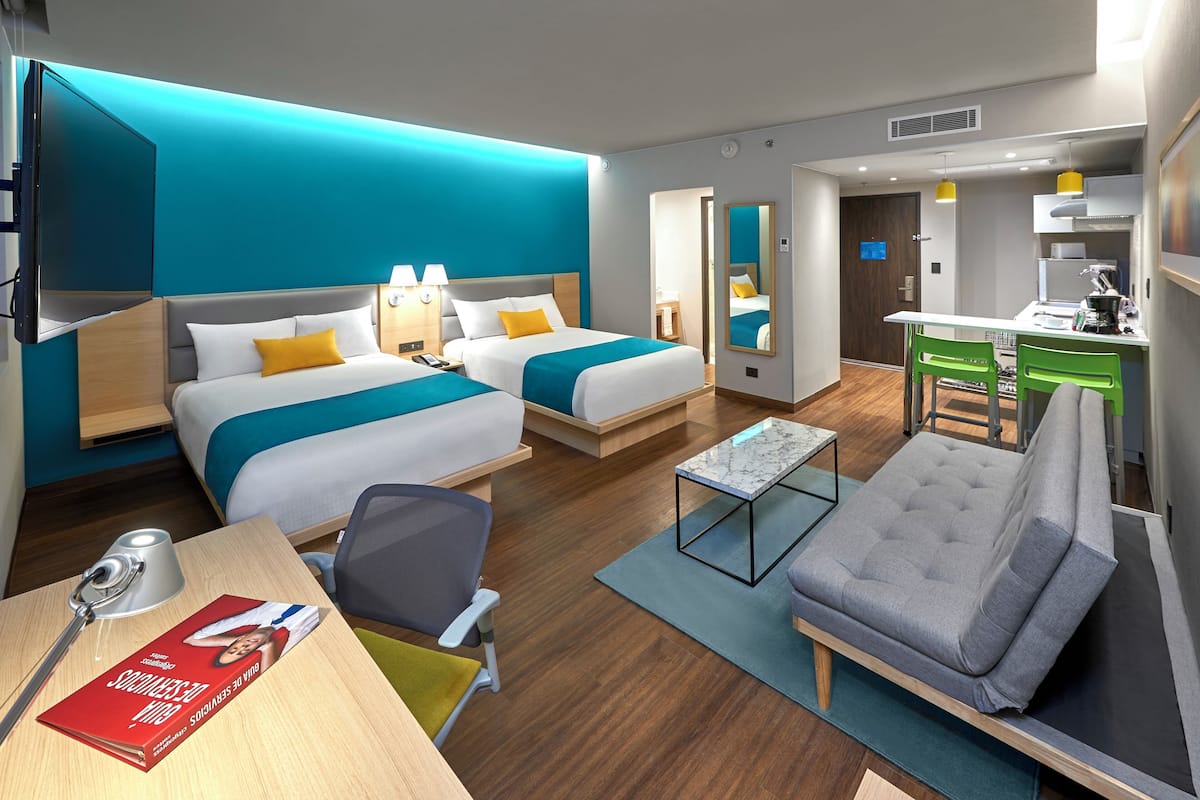 Coffres-forts dans les chambres, bureau, fer et planche à repasser