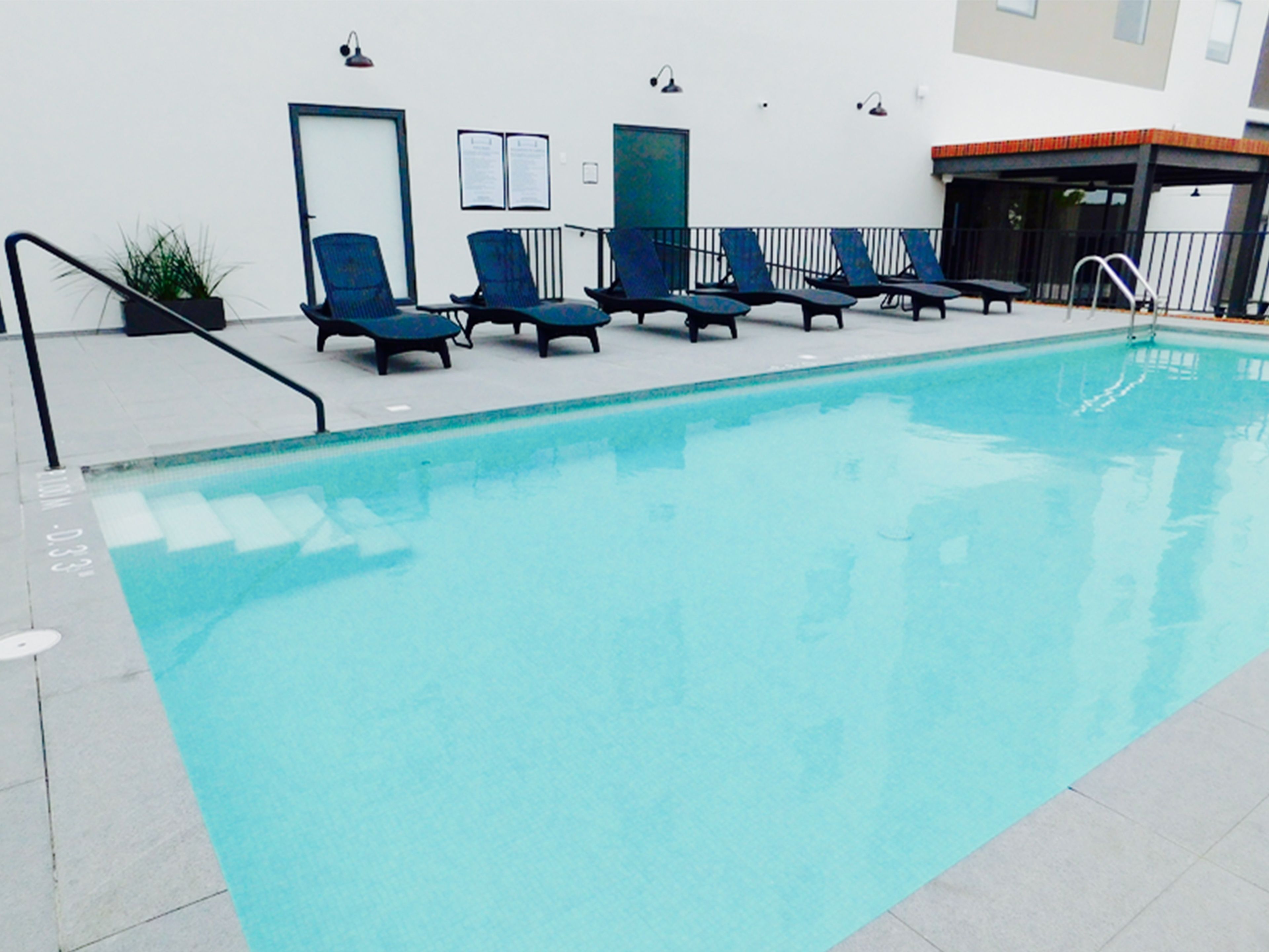 outdoor pool, open 7 am to 10 pm, pool loungers