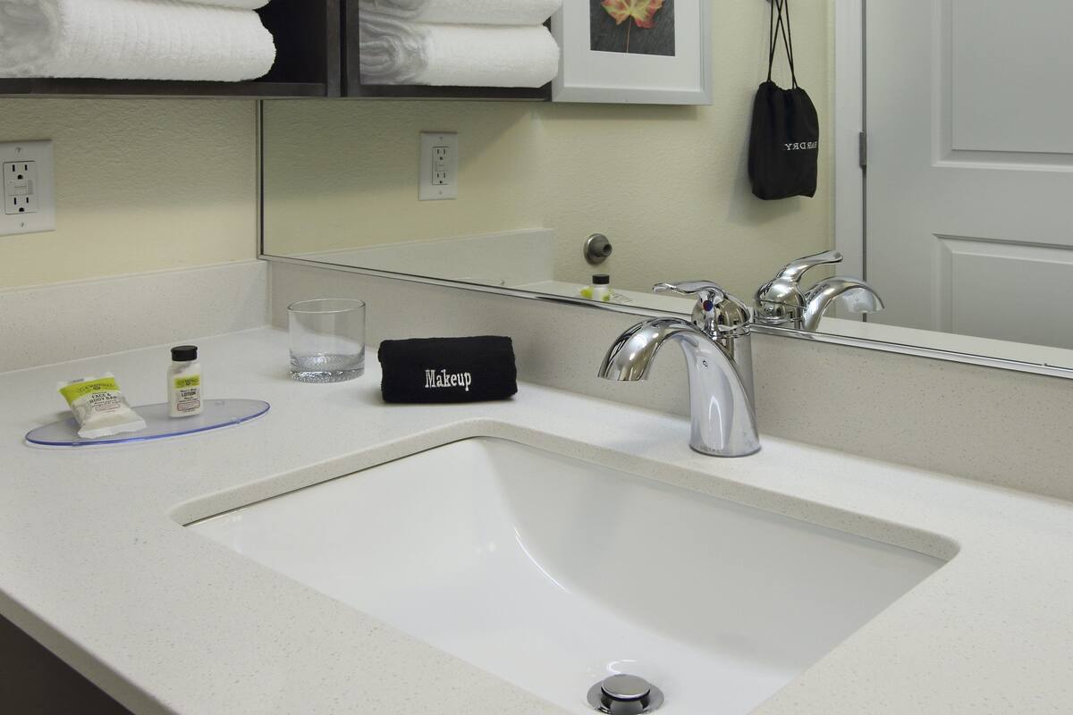 hair dryer, towels, soap, shampoo