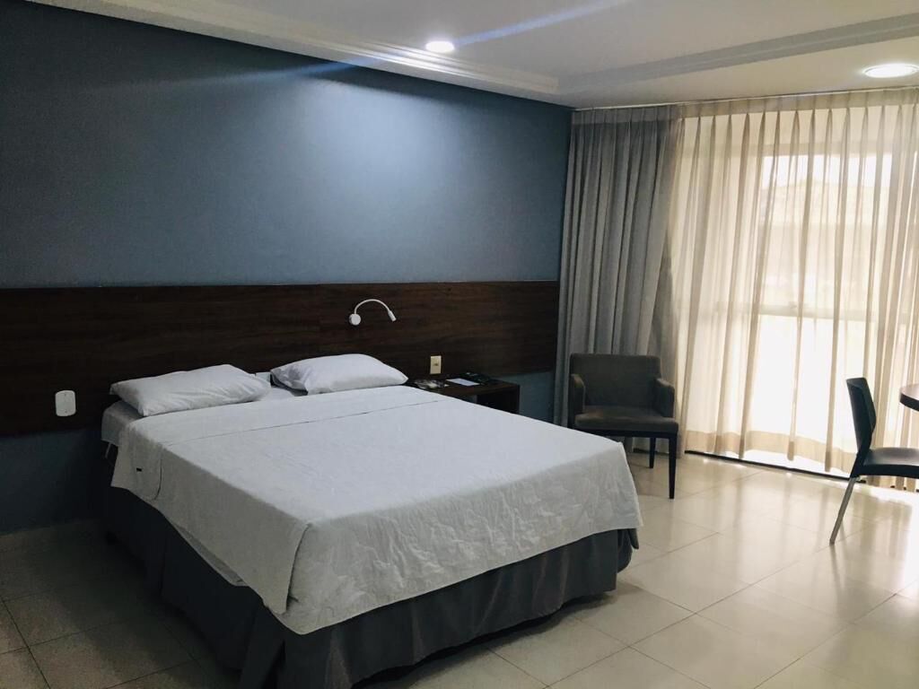 Frigobar, cortinas blackout, Wi-Fi de cortesia, roupa de cama