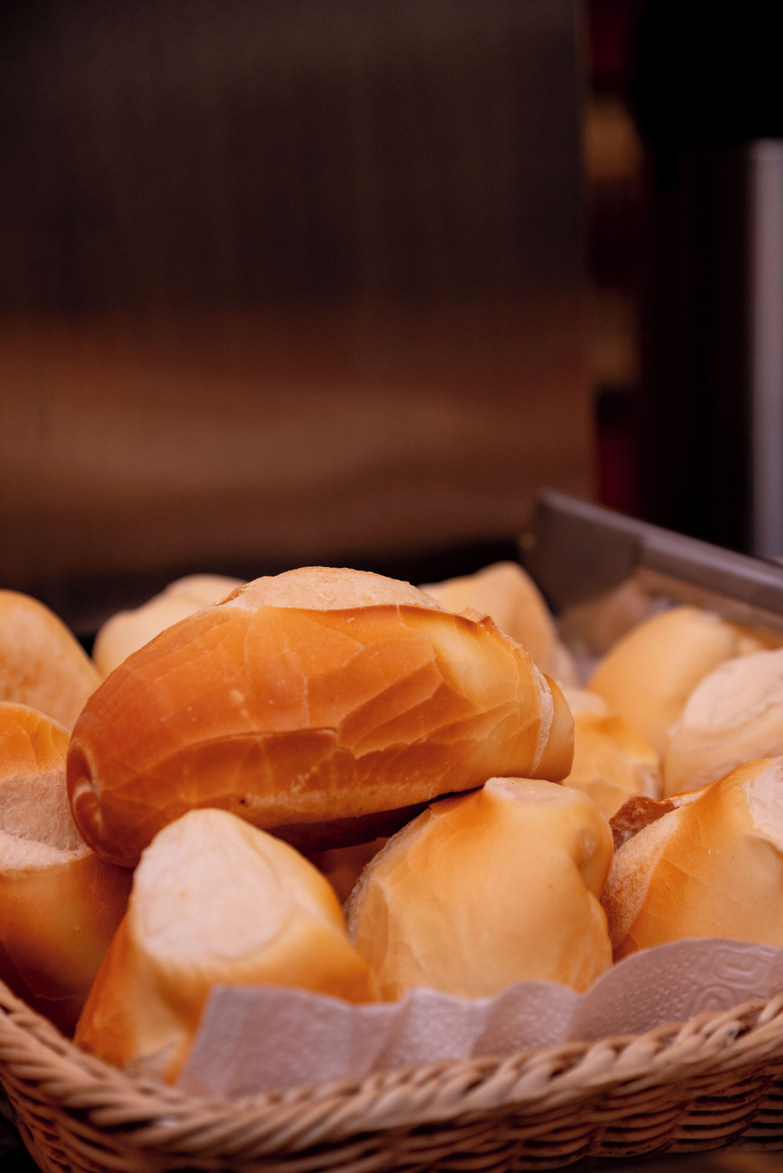 A basket of various bread rolls.