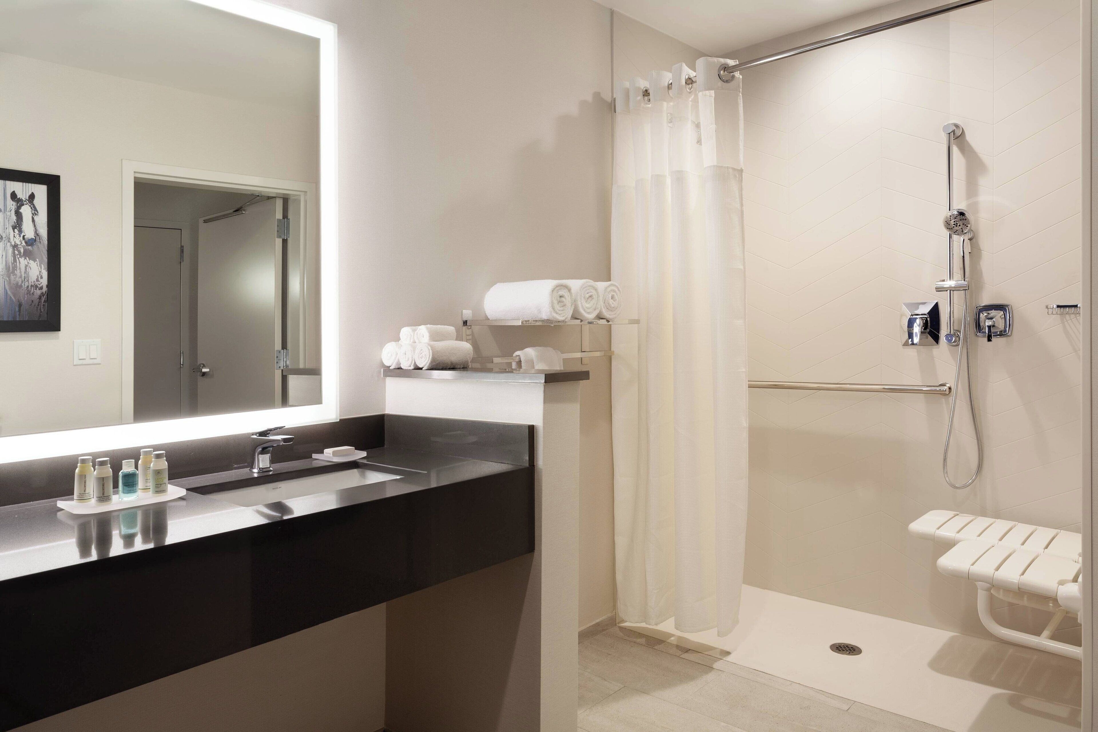 combined shower/bathtub, free toiletries, hair dryer, towels