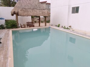 Outdoor pool, free cabanas, pool umbrellas