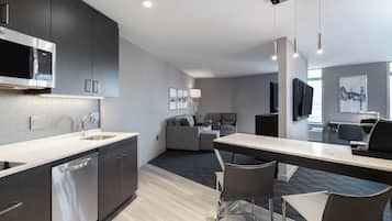 Studio, 1 King Bed with Sofa bed | Private kitchen | Fridge, microwave, stovetop, dishwasher