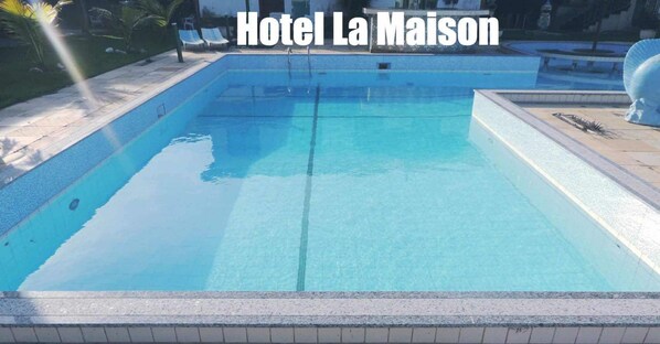 Outdoor pool, open 8 AM to 8 PM, sun loungers
