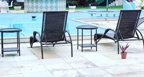 Outdoor pool, open 8 AM to 8 PM, sun loungers