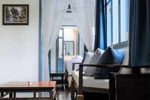 Colonial Suite | Living area | Flat-screen TV - Baan Vajra (Bangkok)