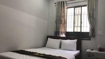 Deluxe Room | Minibar, desk, blackout drapes, free WiFi