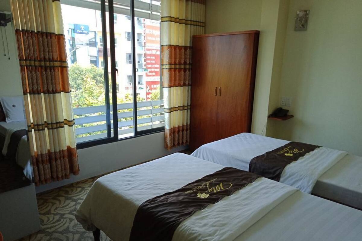 Deluxe Twin Room, City View | Minibar, desk, blackout drapes, WiFi (free)