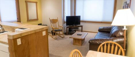 Condo, 1 Bedroom | Living area | TV, fireplace, video games