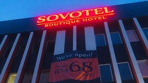 The exterior of the Sovotel Boutique Hotel with a sign indicating availability and price. - Sovotel 9 Puchong (Puchong)