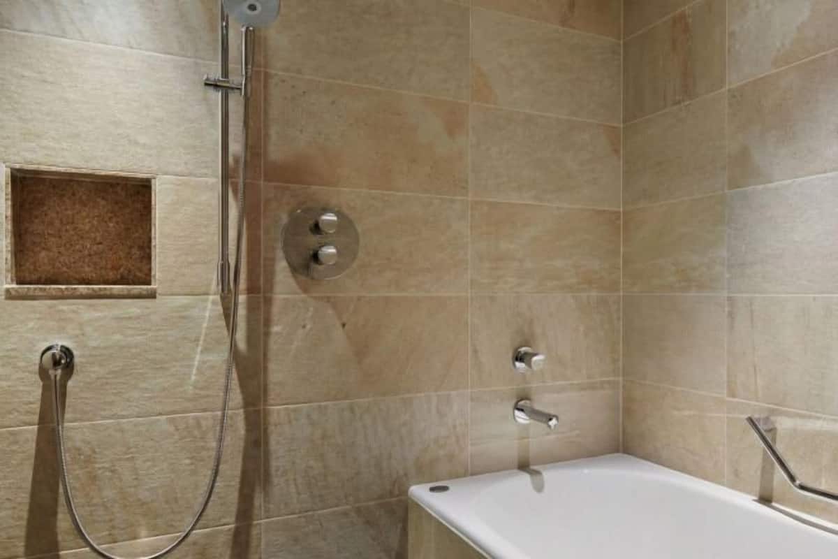 Separate tub and shower, deep soaking tub, hair dryer, slippers