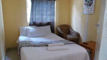 Suíte econômica, para não fumantes, vista para o jardim | Lençóis italianos Frette, roupas de cama premium, edredons de pluma