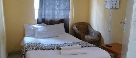 Economy Suite, Non Smoking, Garden View | Frette Italian sheets, premium bedding, down comforters, pillowtop beds