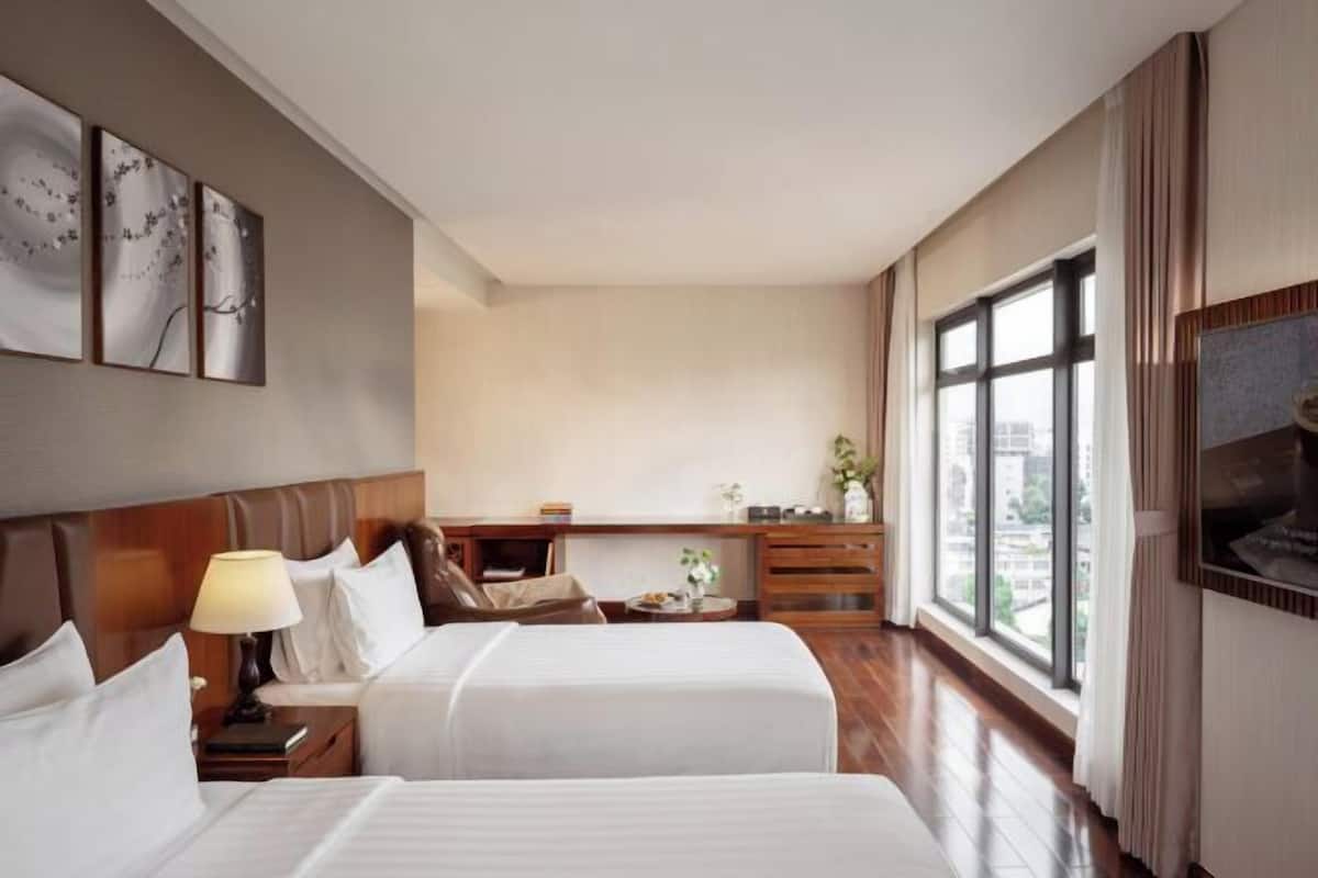 Hypoallergeen beddengoed, een minibar, een kluis op de kamer, een bureau