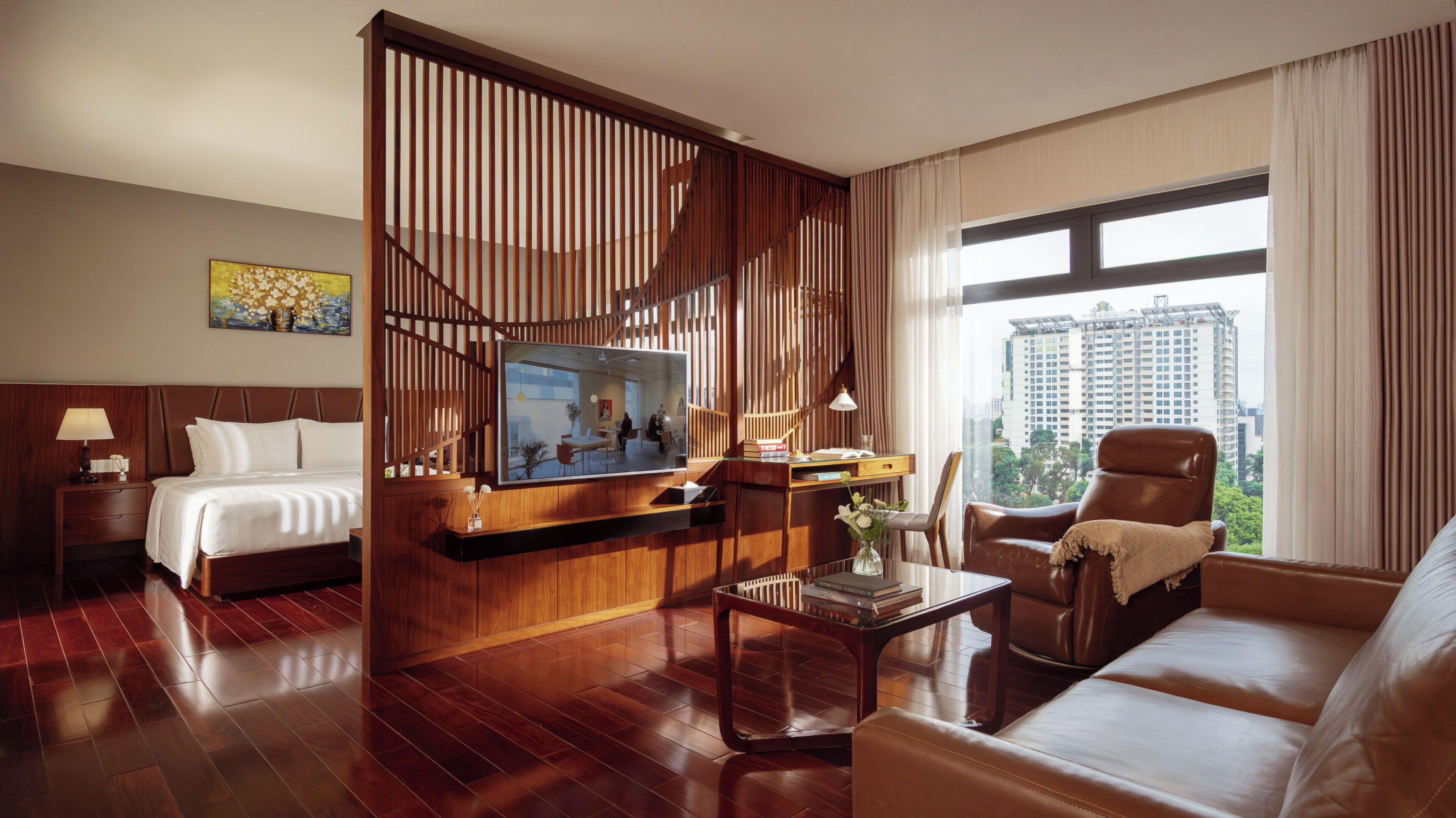 orchids suite with city view | living area | 43-inch flat-screen tv with cable channels, tv