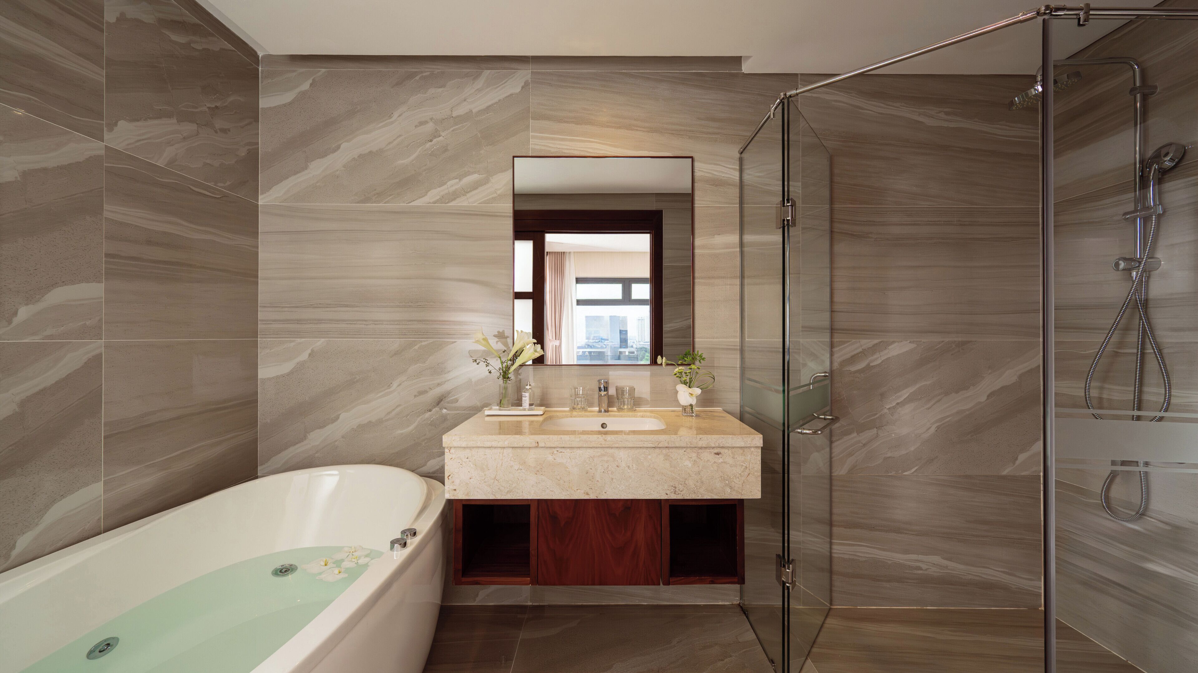 orchids suite with city view | bathroom | free toiletries, hair dryer, bathrobes, slippers