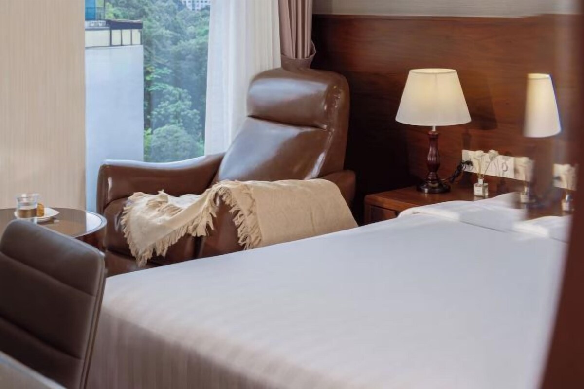 Hypoallergeen beddengoed, een minibar, een kluis op de kamer, een bureau