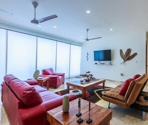 Condo | Sala de estar | TV