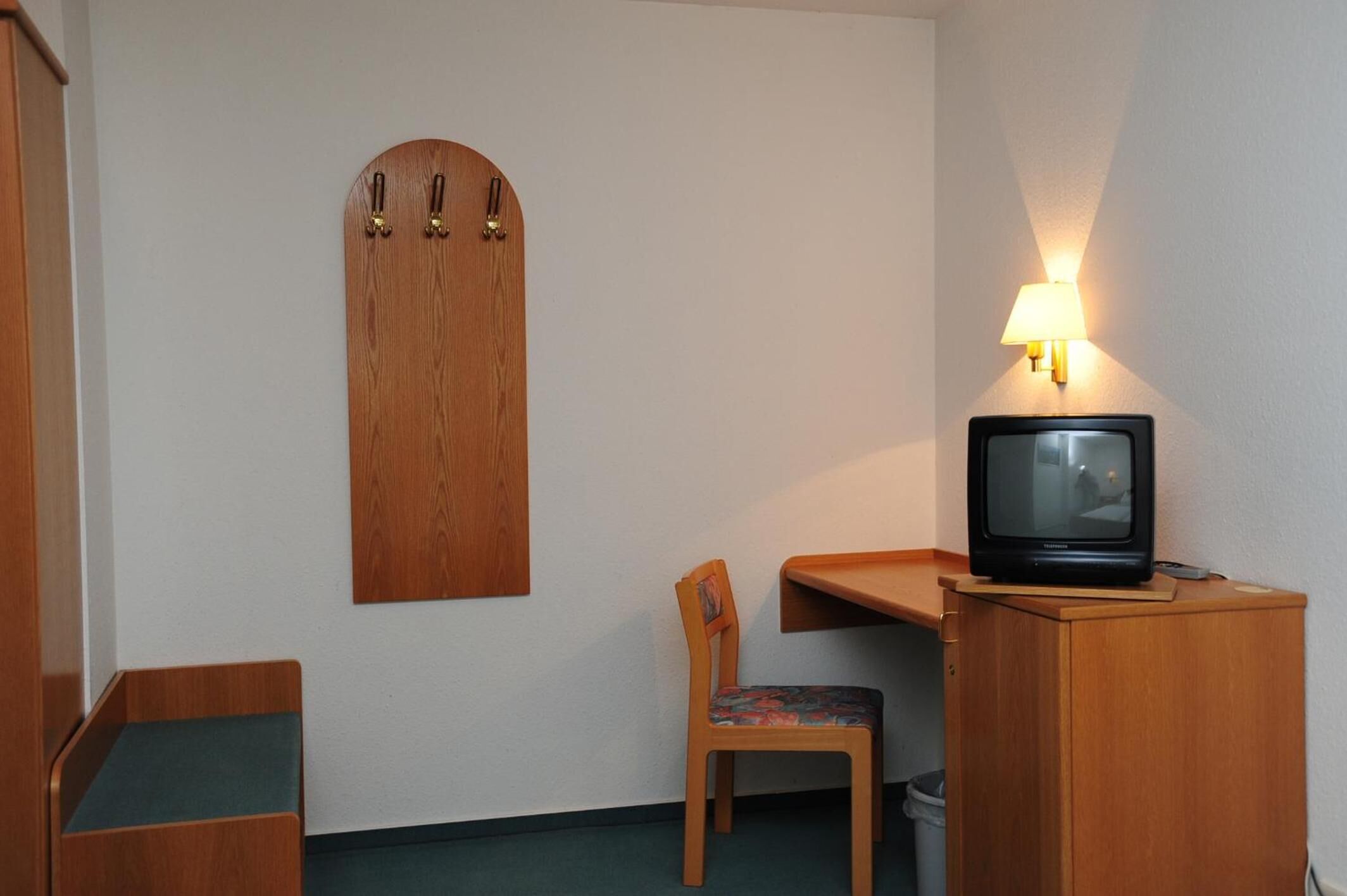 hypo-allergenic bedding, individually furnished, desk, blackout curtains