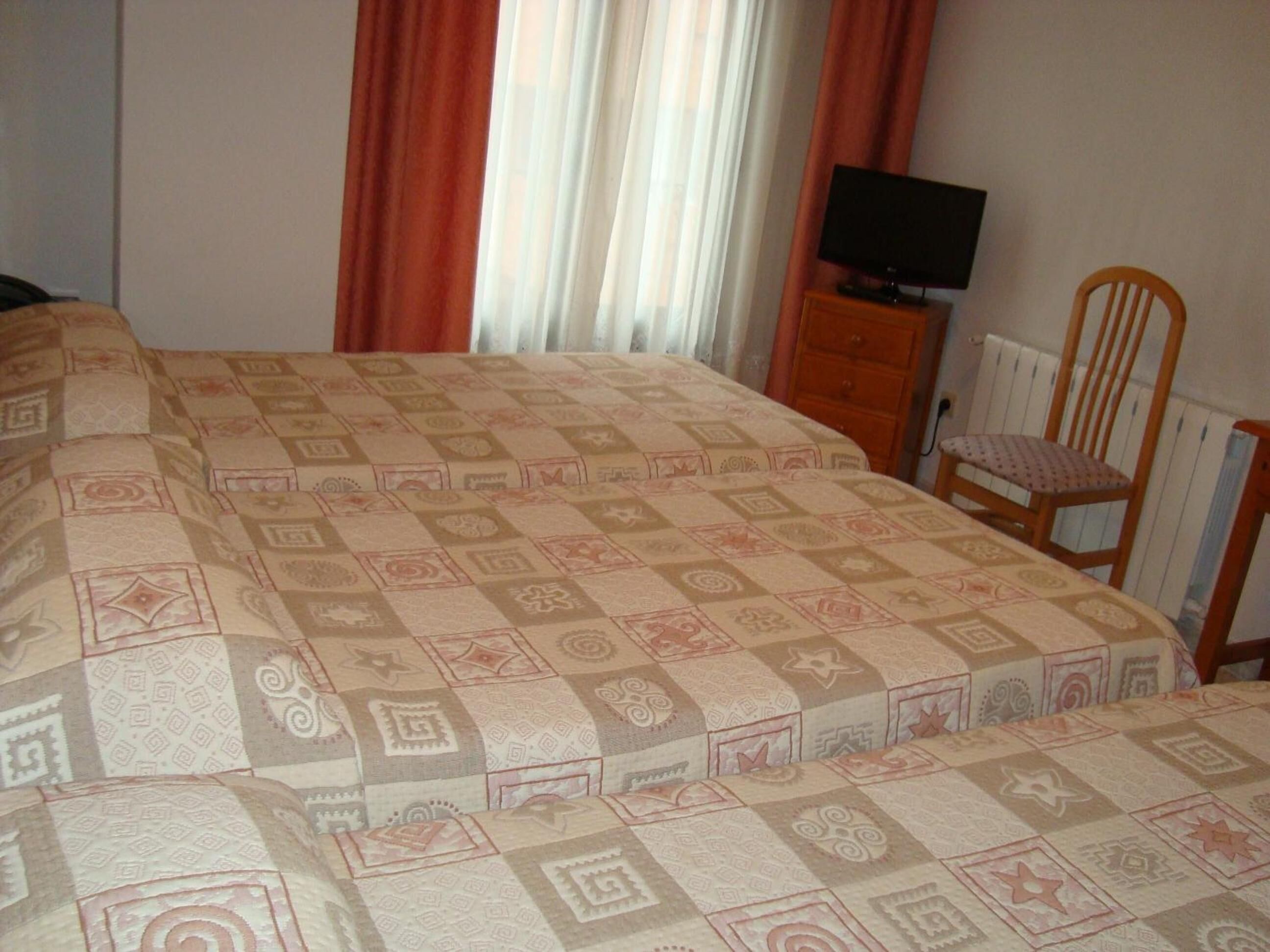 Foto - Hostal Universal