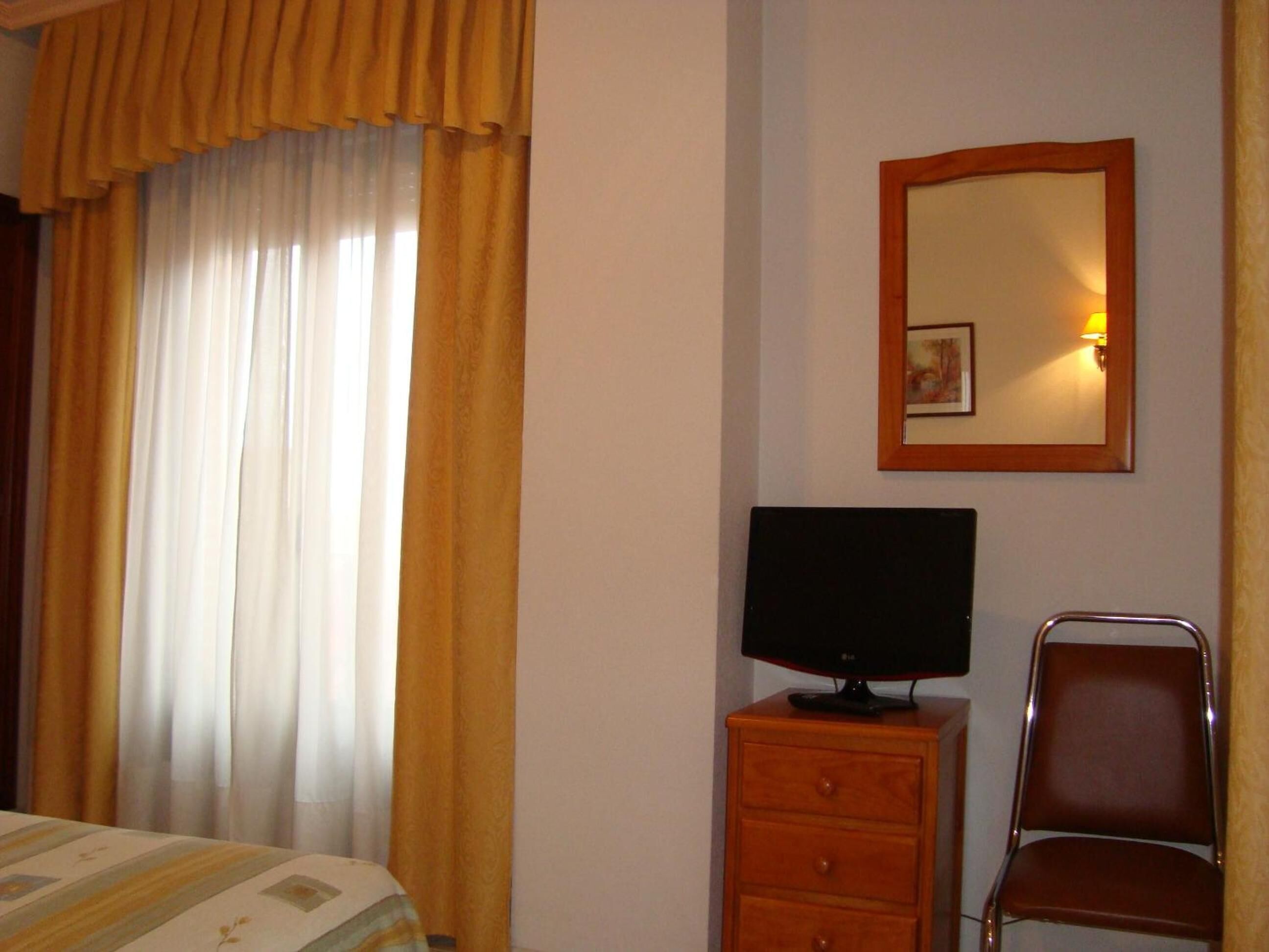 Foto - Hostal Universal