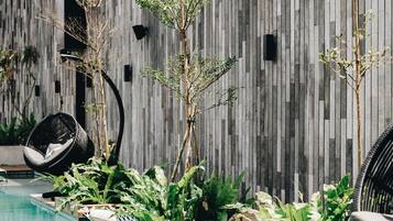 Outdoor pool, open 9:00 AM to 6:00 PM, pool loungers