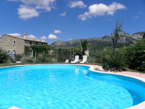 Seasonal outdoor pool, pool umbrellas, sun loungers