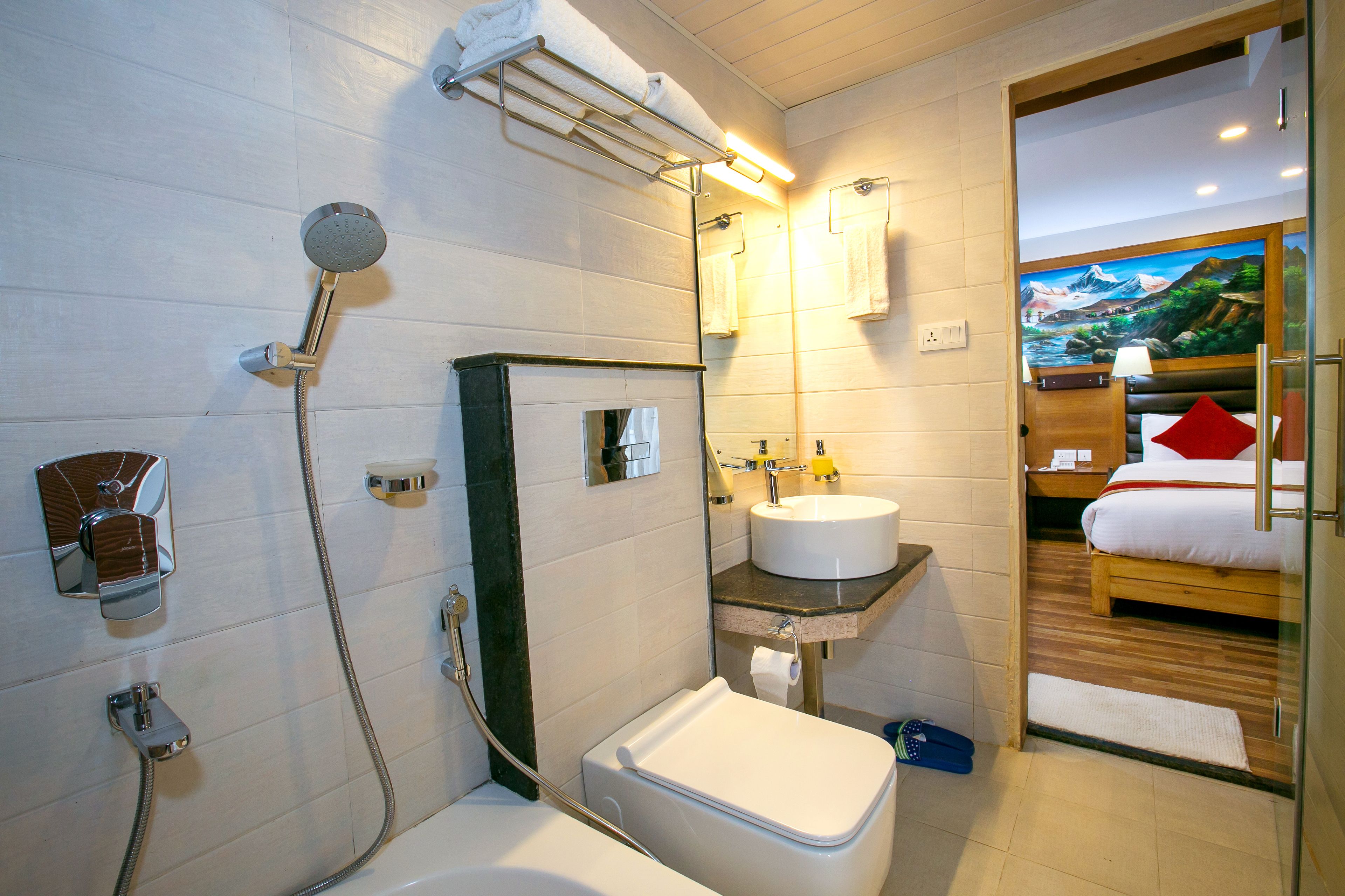 shower, designer toiletries, hair dryer, slippers