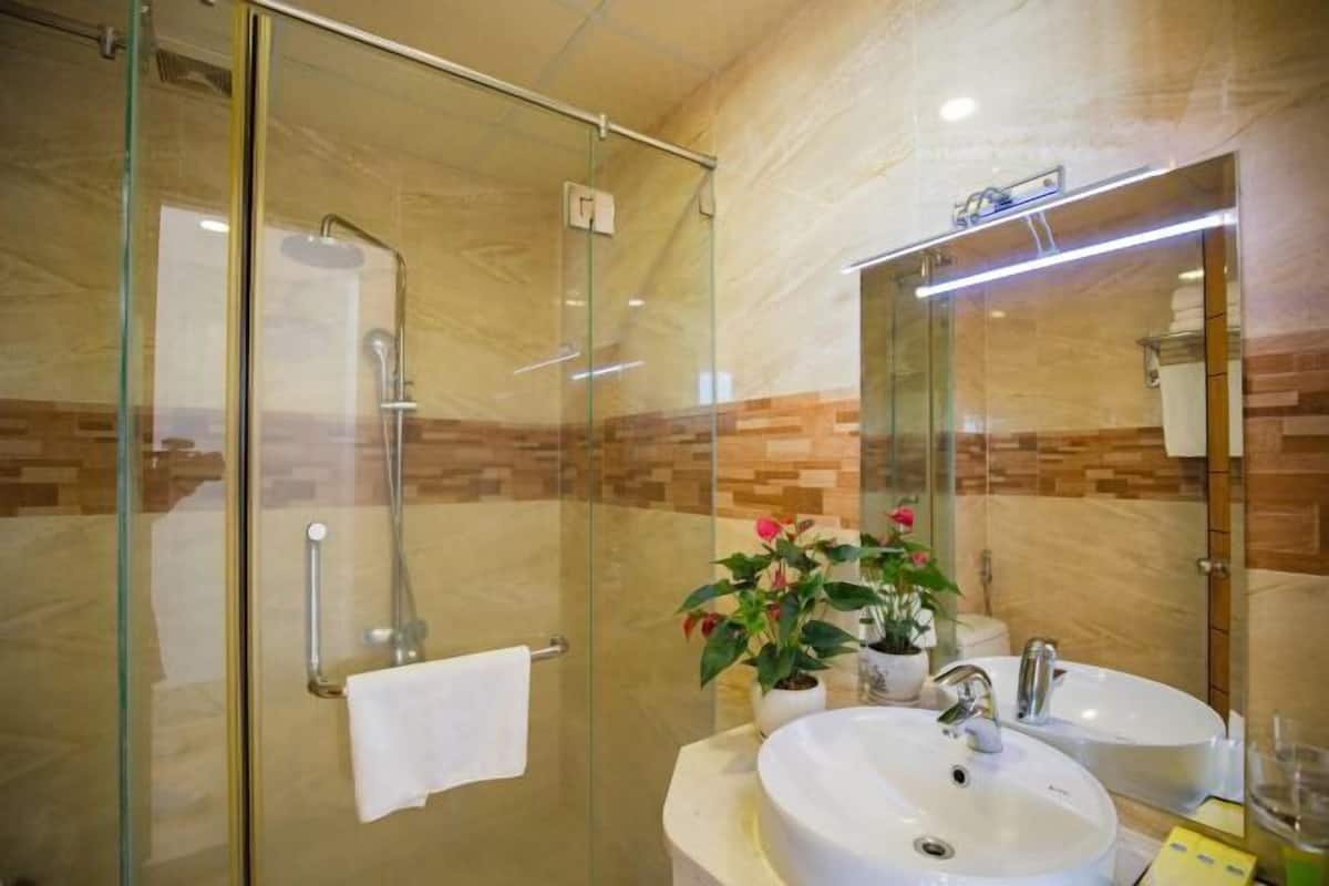 Bathroom | Shower, hydromassage showerhead, designer toiletries, hair dryer