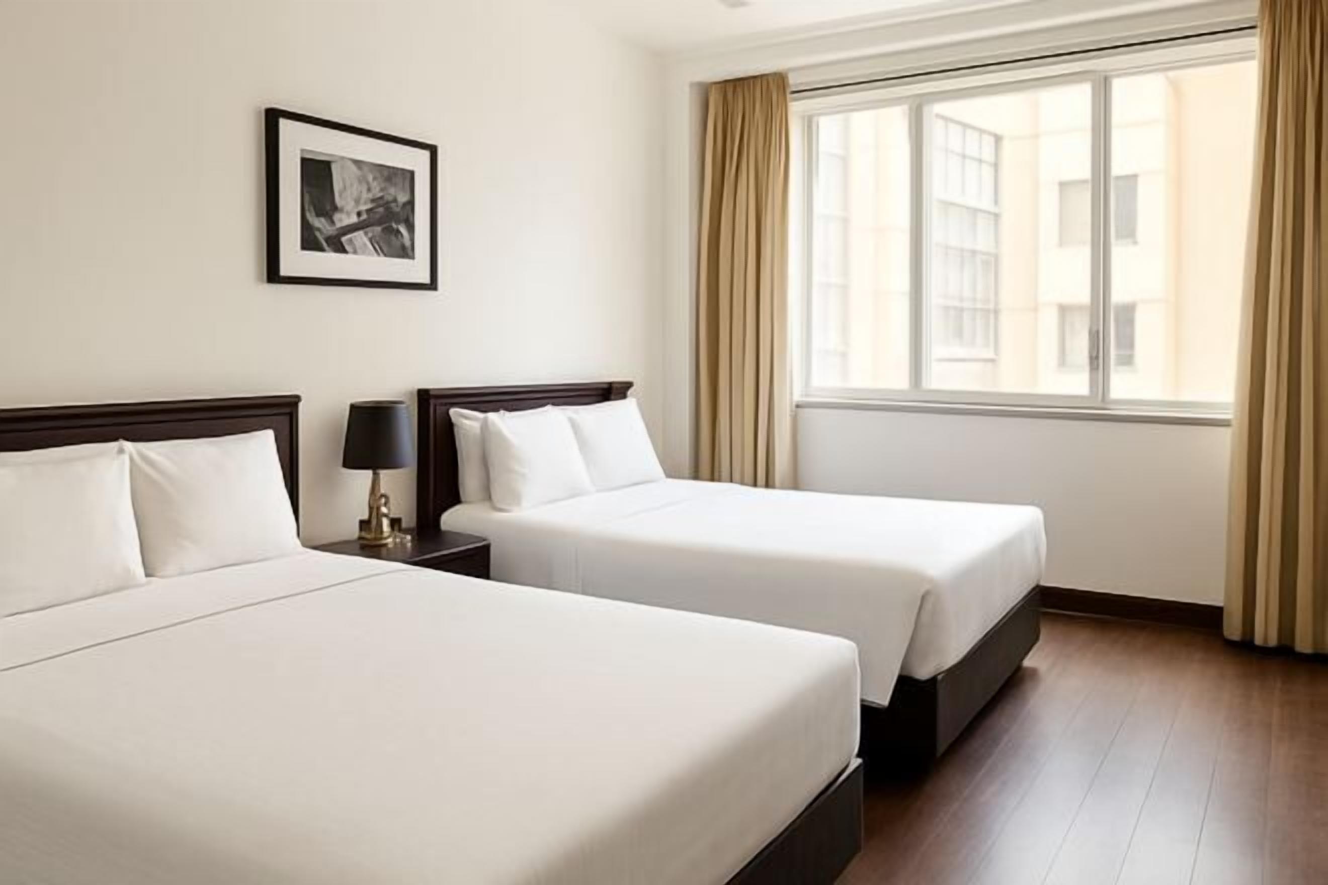 Hypo-allergenic bedding, down comforters, minibar, in-room safe