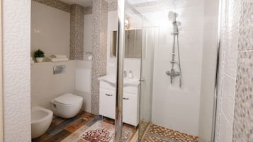 Exclusive Apartment, Multiple Beds, Non Smoking | Bathroom | Free toiletries, hair dryer, bathrobes, slippers