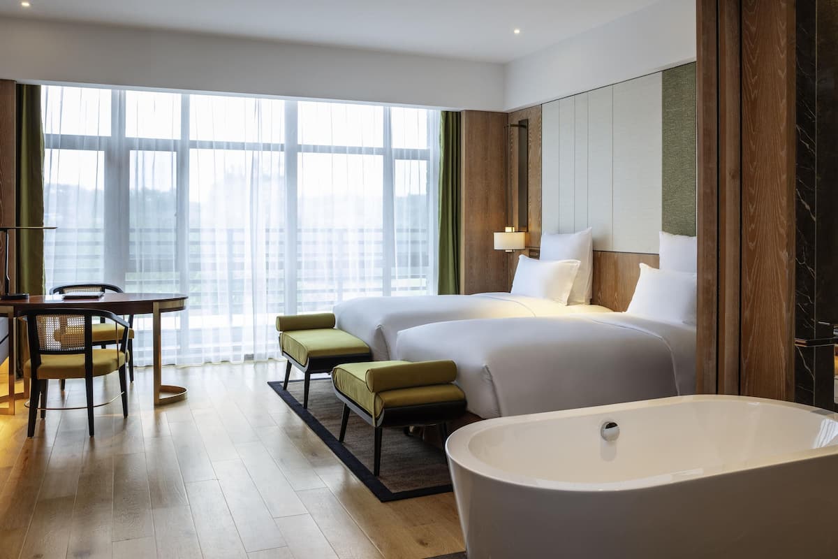 Deluxe Room, 2 Twin Beds, Balcony | Premium bedding, down comforters, pillowtop beds, minibar