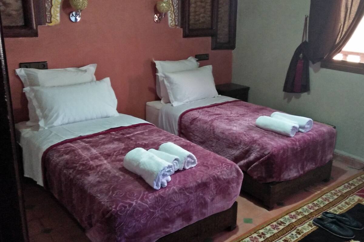 Desk, free WiFi, bed sheets