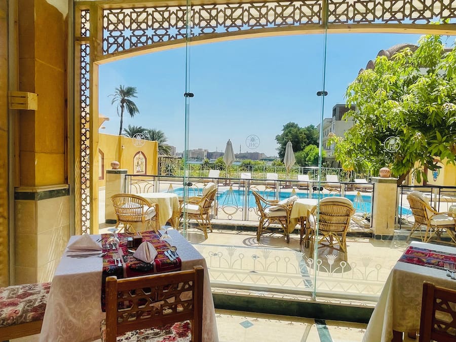 Breakfast, lunch, dinner served; pool views