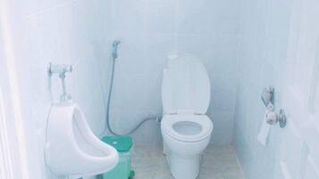 Standard Quadruple Room, Shared Bathroom | Bathroom | Shower, free toiletries, hair dryer, slippers