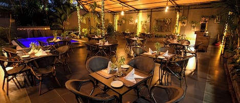 Outdoor pool, open 6:30 AM to 7 PM, pool loungers