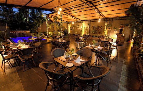 Outdoor pool, open 6:30 AM to 7 PM, pool loungers. Athena Hotel Kampala