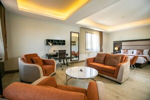 Living area | Flat-screen TV - Athena Hotel Kampala (Kampala)