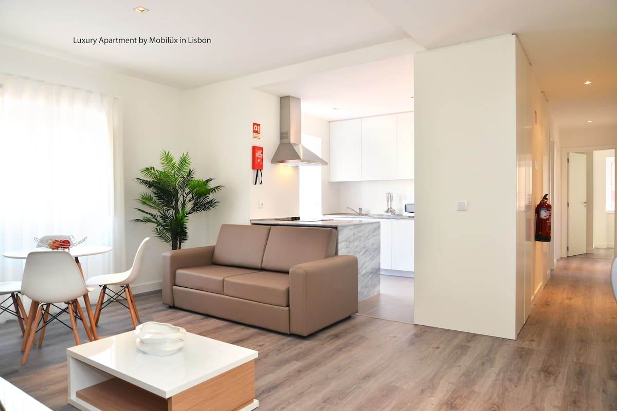 Apartamento, 2 quartos | Sala de estar | TV LCD