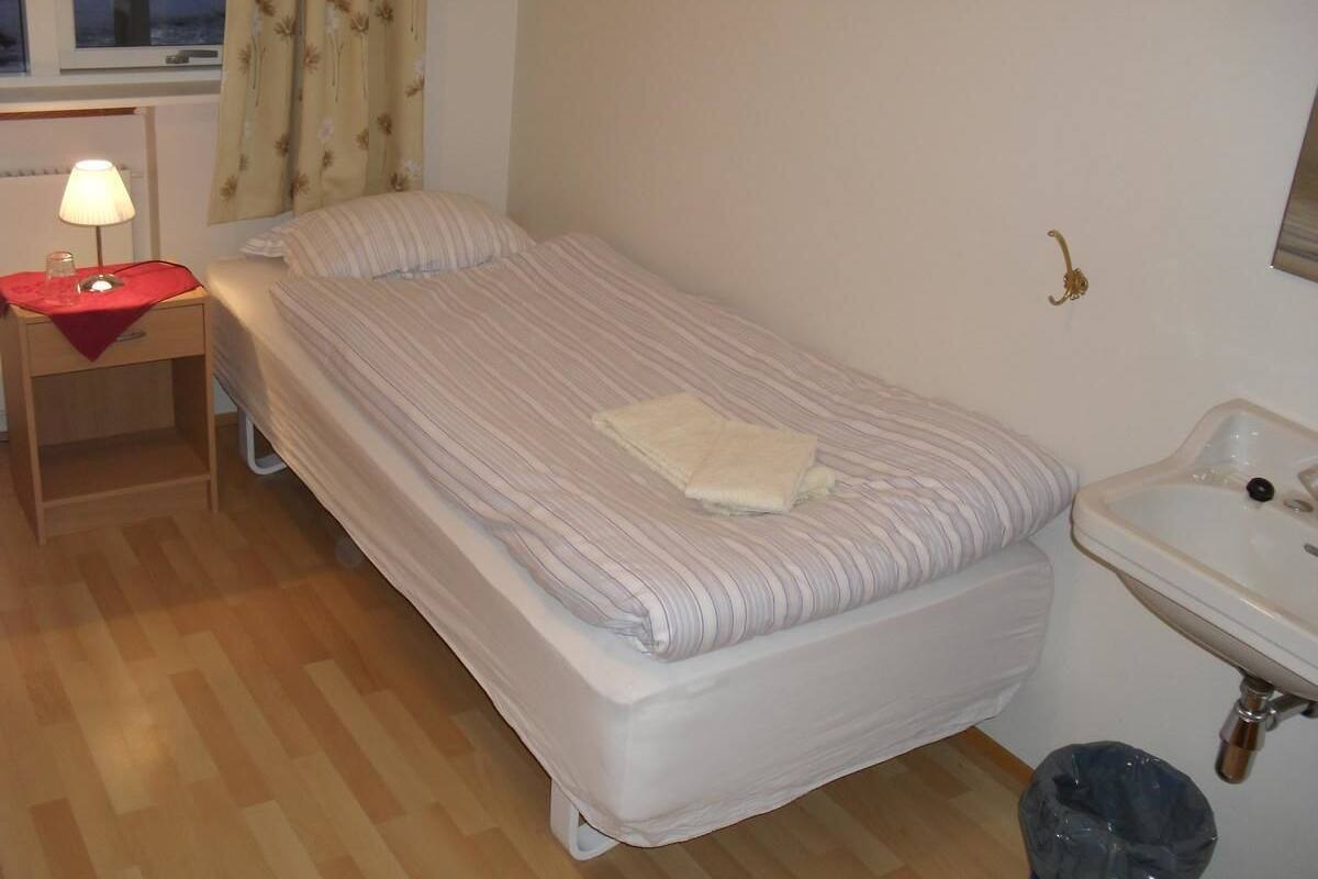 Habitación individual, baño compartido | Cortinas opacas, wifi gratis, ropa de cama