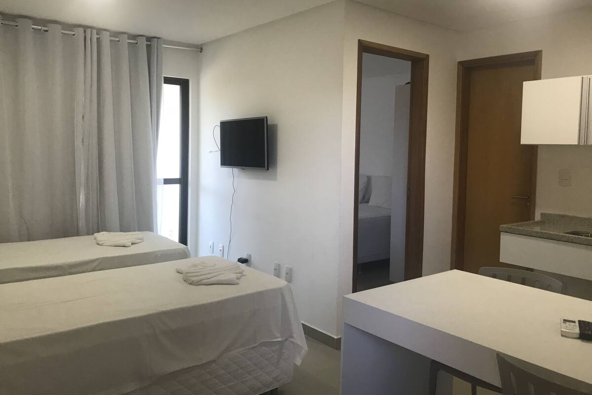 Comfort Quadruple Room, Multiple Beds, Non Smoking | Living area | Flat-screen TV