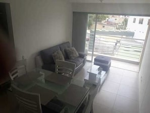 Economy Apartment, 1 Double Bed, Non Smoking | Living area | Flat-screen TV
