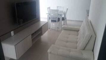 Apartment, 3 Bedrooms | Living room | Flat-screen TV