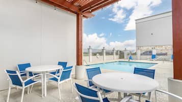 Outdoor pool, open 10:00 AM to 10 PM, sun loungers