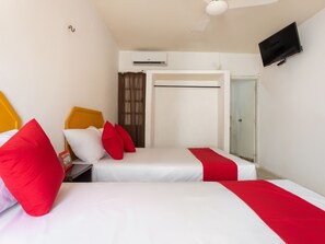Quarto superior, 2 camas Queen | Wi-Fi de cortesia, roupa de cama