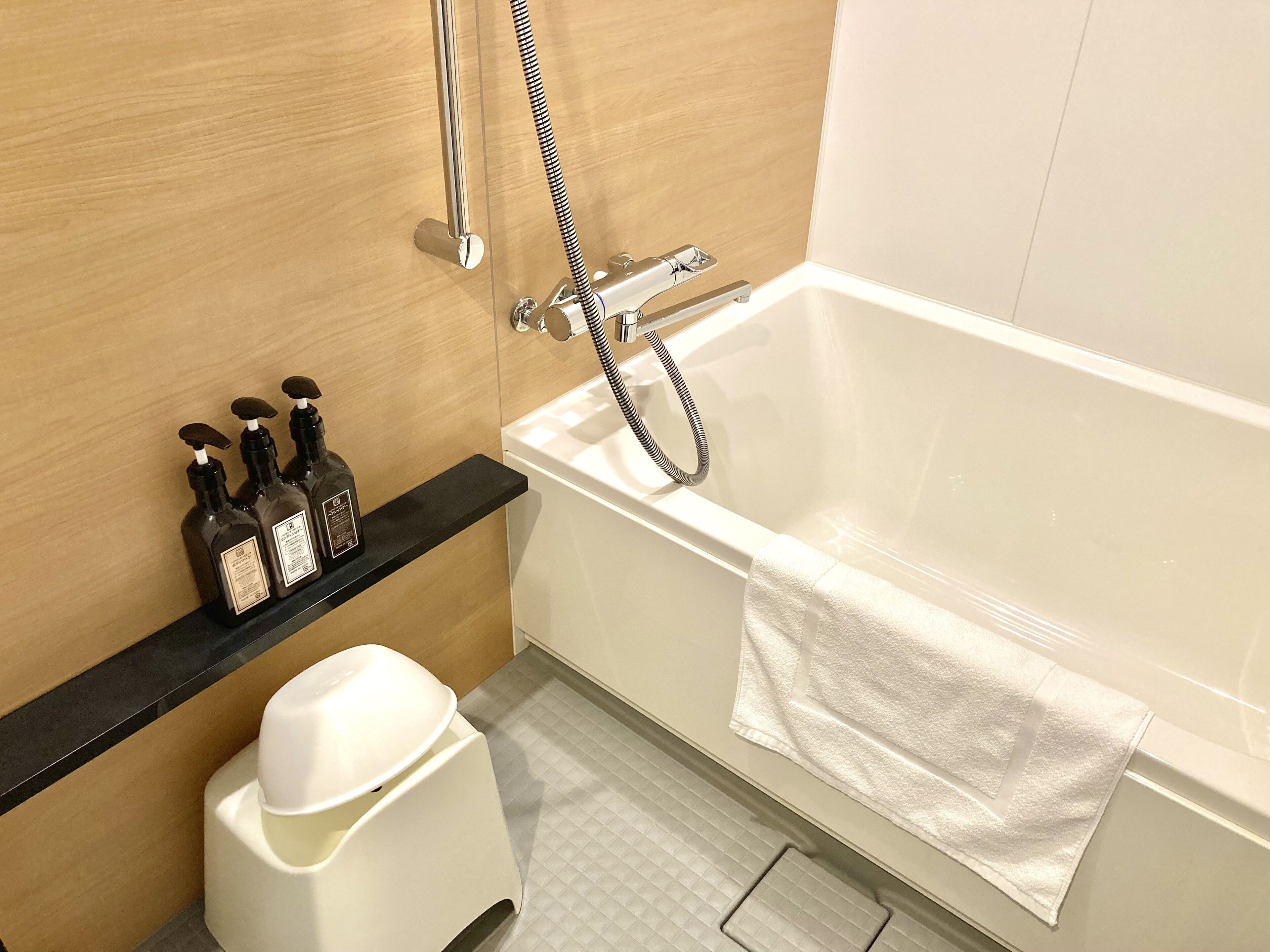 separate bathtub and shower, free toiletries, hair dryer, bathrobes