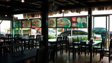 Breakfast, lunch, dinner served; local cuisine