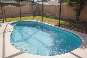 Seasonal outdoor pool, pool umbrellas, pool loungers