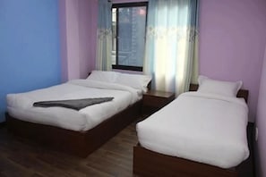 Stupa View Room, Private Bathroom | Individually furnished, desk, rollaway beds, free WiFi